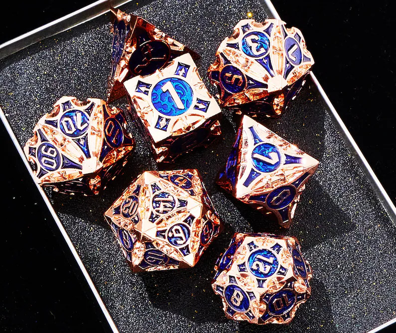 A promotional image of the metal DnD dice set by ShowDiceShop on Etsy. 