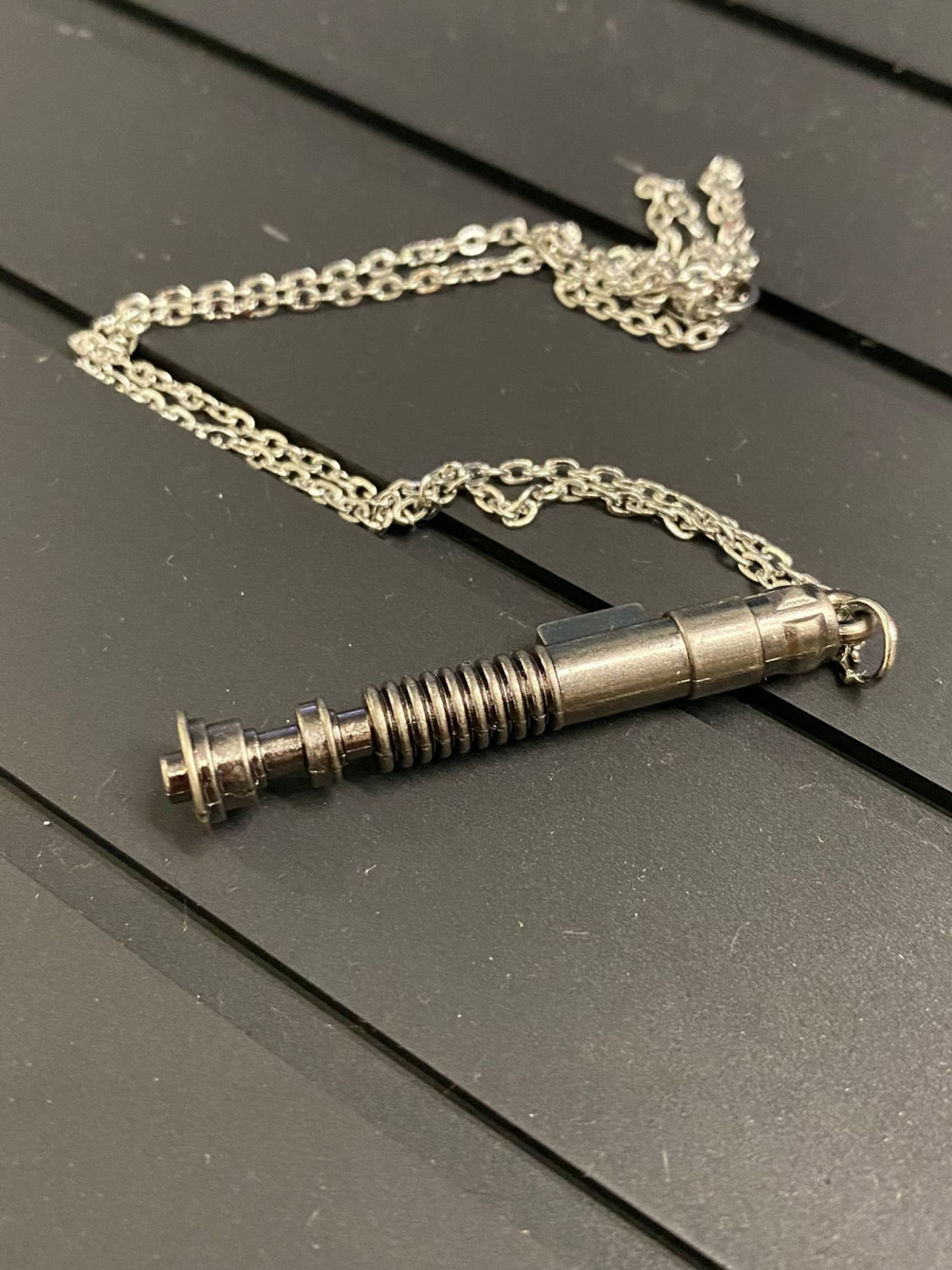 Lightsaber handle charm necklace 