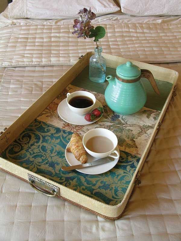 A tea tray made by utilizing an old suitcase