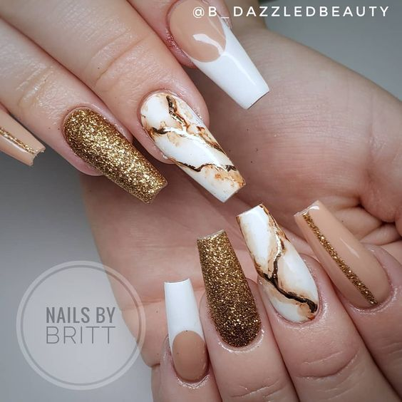 Full picture showing the marbled gold nails