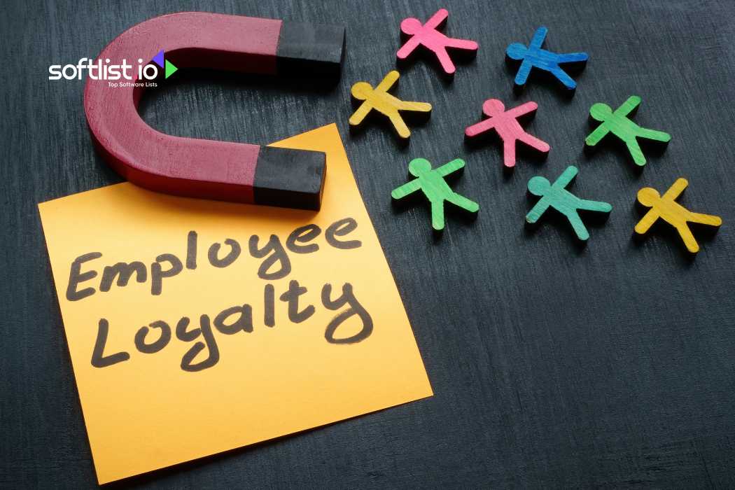 Magnet and wooden figures with text Employee Loyalty