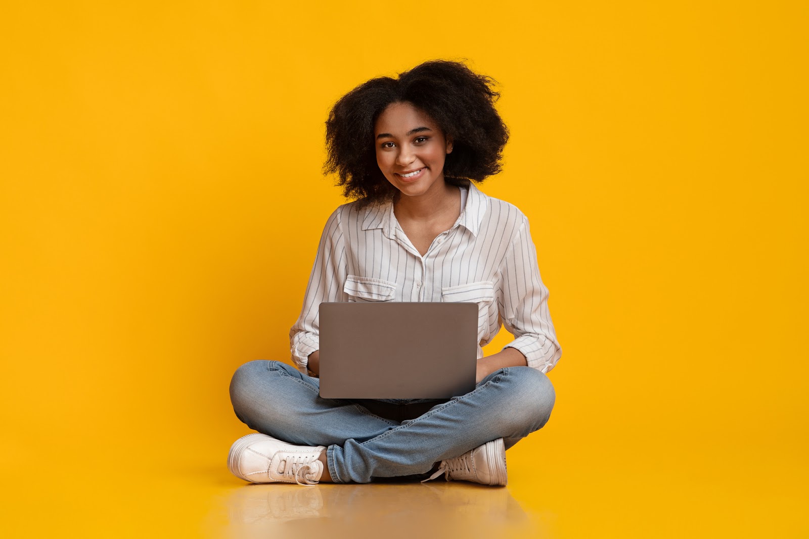 Freelance Concept. Happy Black Girl Sitting With Laptop, Working Online