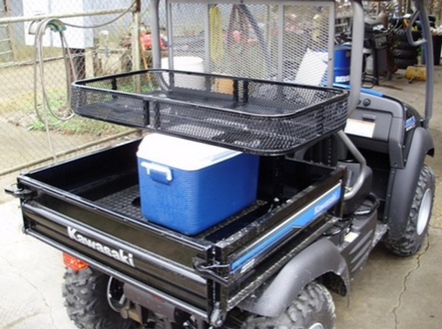 An image of a Honda Talon with a basket rack by Strong Made installed above the bed.