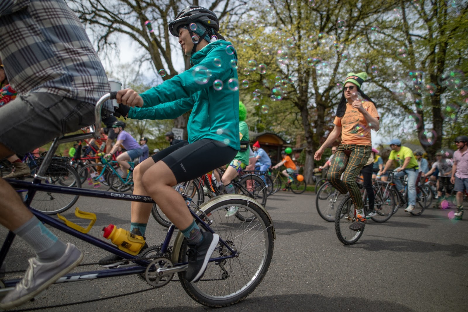 Two people on a tandem bike and one person (obviously) on a unicycle during the Ladd's 500 in Portland.