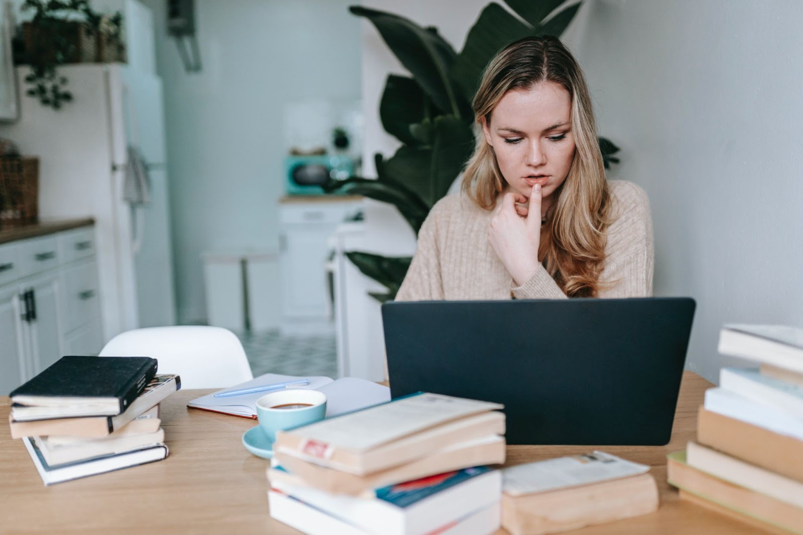 Female Student thinking How to Pick The Right Liability Insurance for Students and Expats