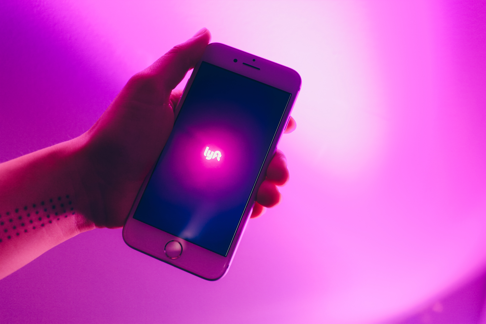 lyft app opening on an iphone rideshare services theme
