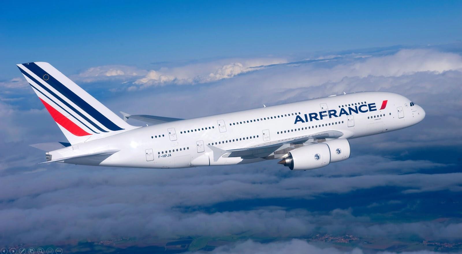 Air France aircraft is shown in the picture while flying over the clouds. the article is delta vs air france