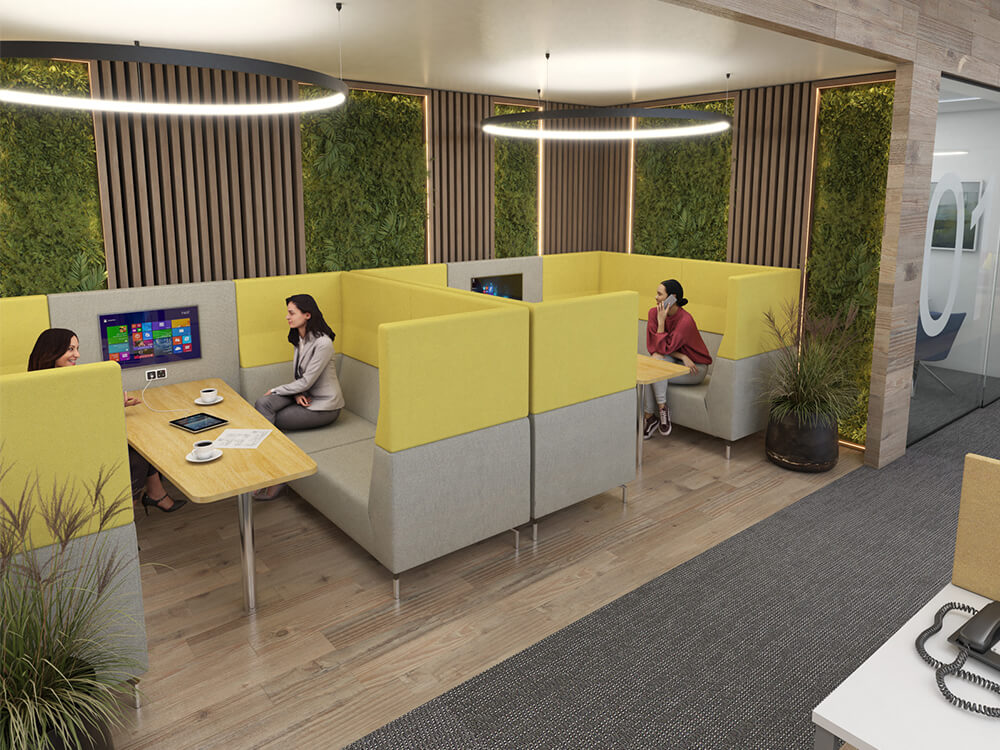 Office employees sitting in multi-seating pods