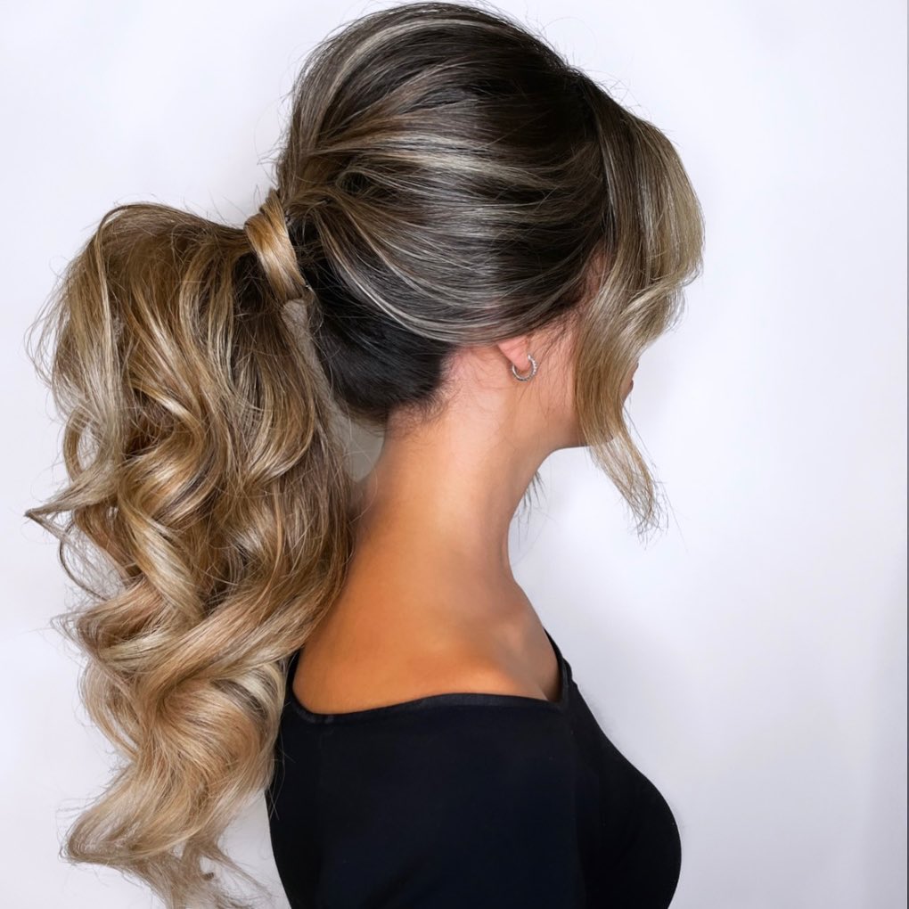 Textured low messy ponytail 