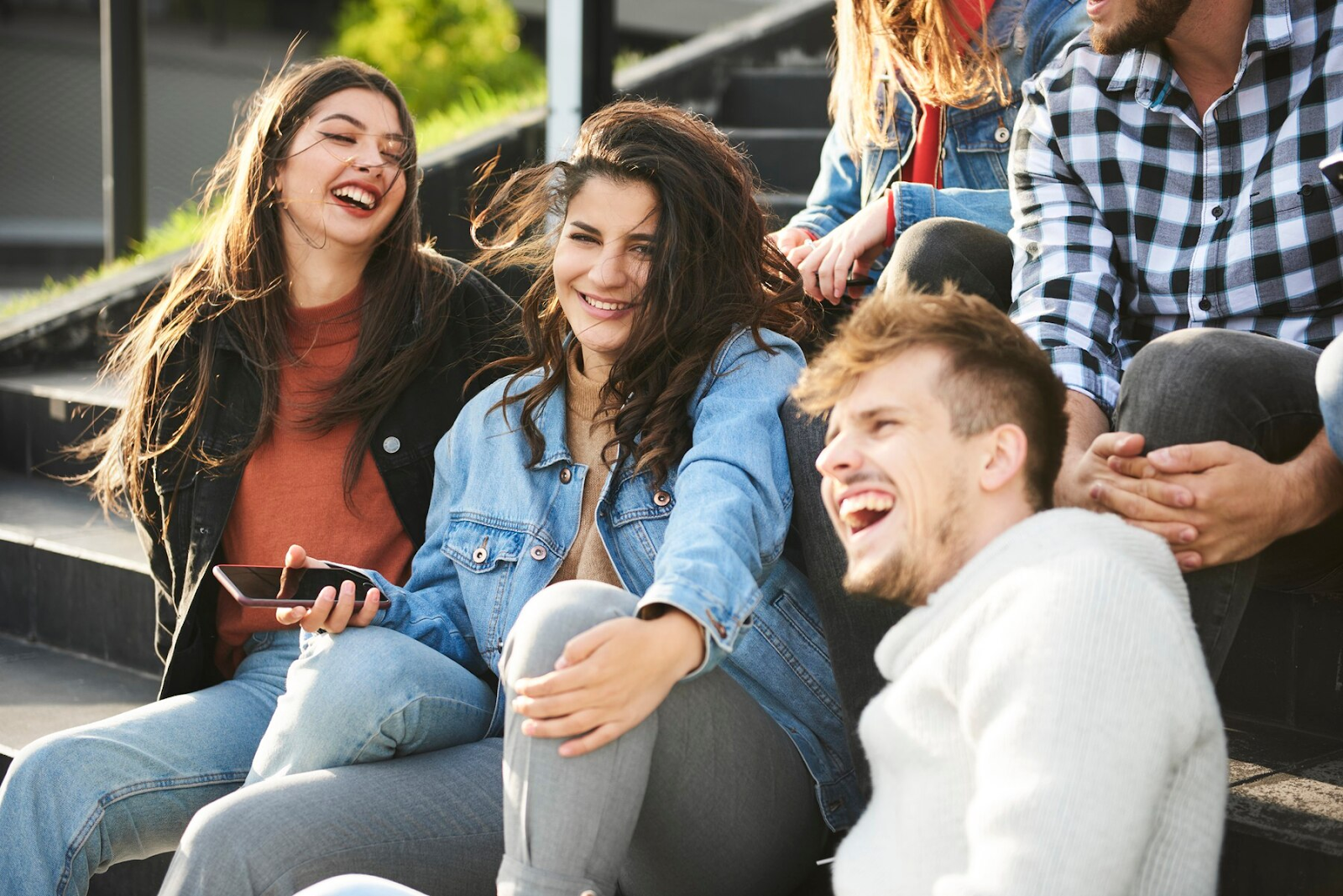 Teenagers laughing and having a good time.