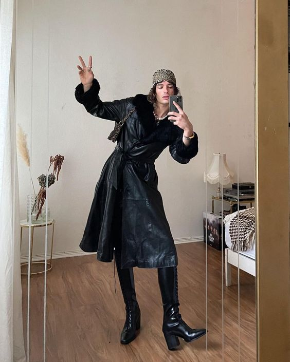 Mirror selfie of a guy rocking coats with the Rick Owens boots 