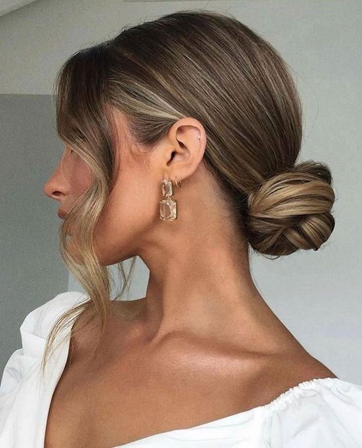 Messy Bun with Curly Strands