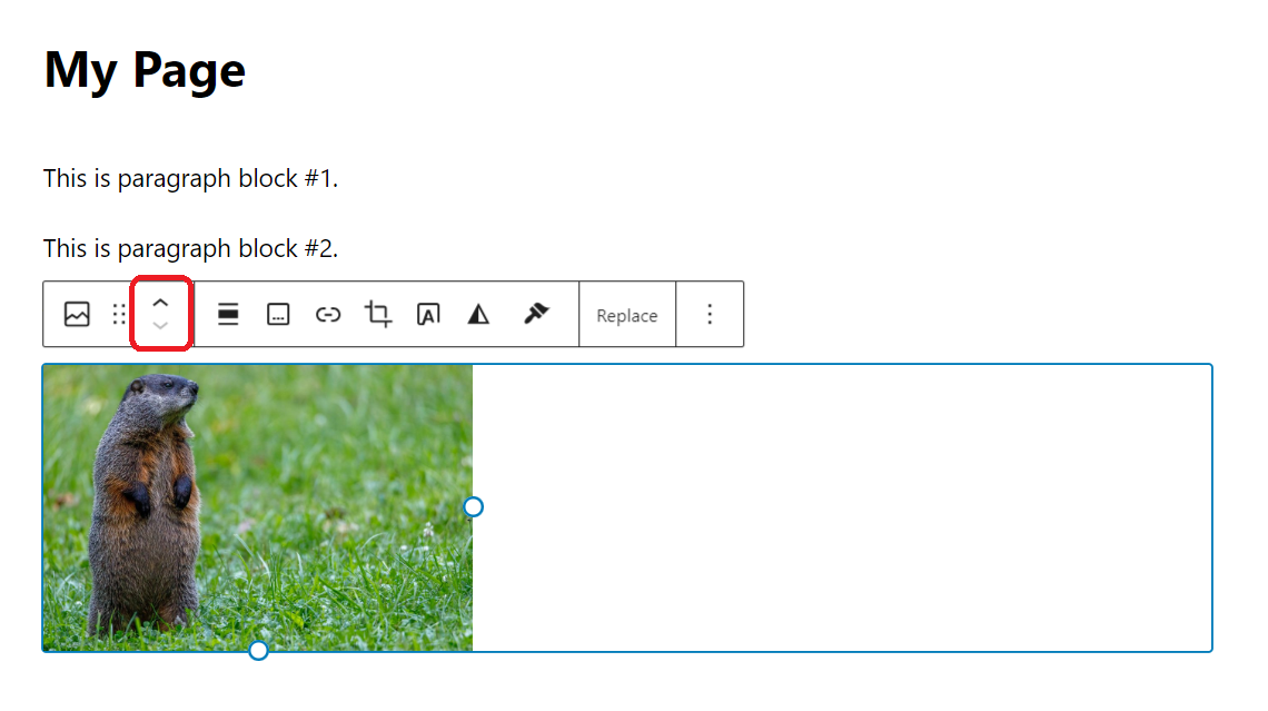 The WordPress page editor with an image block selected, highlighting the up and down arrows in the menu to move the block one spot up or down in the page order.