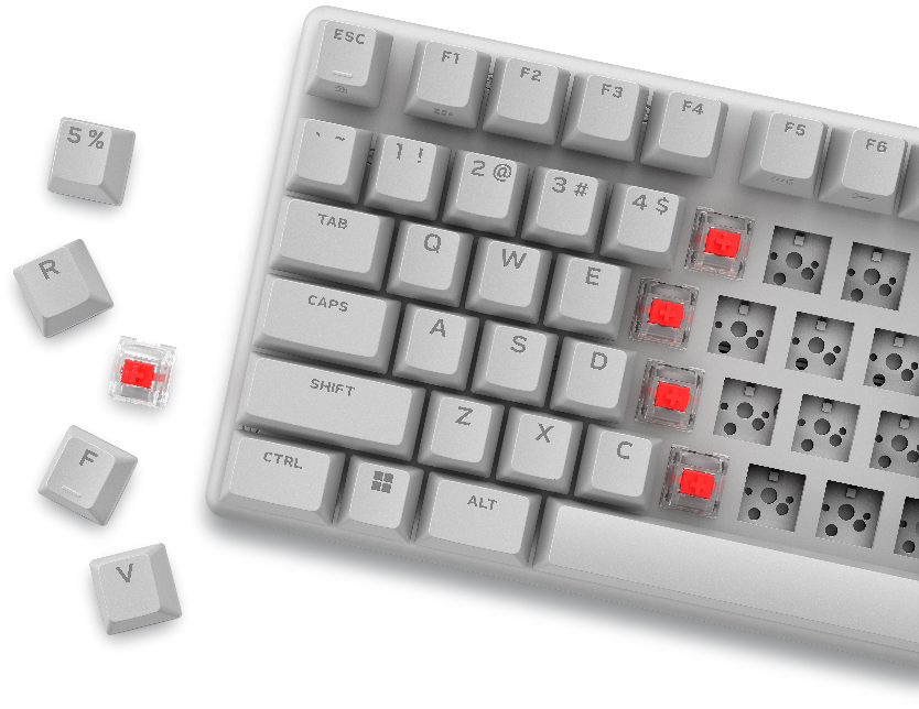 A white keyboard with red buttons

Description automatically generated