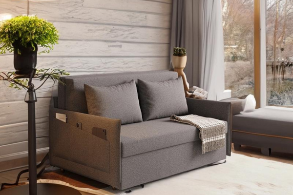 Grey pull-out sofa bed upholstered in linen with wooden frame