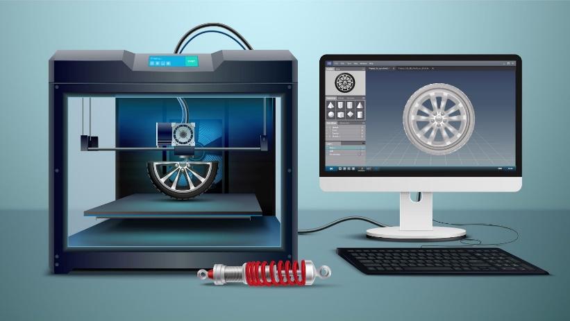 Computador e uma impressora 3D.
