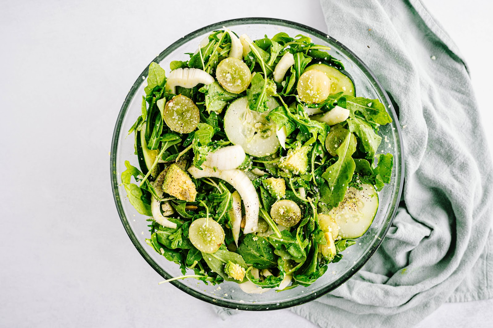 Drizzle lemon vinaigrette on your green salad and toss.