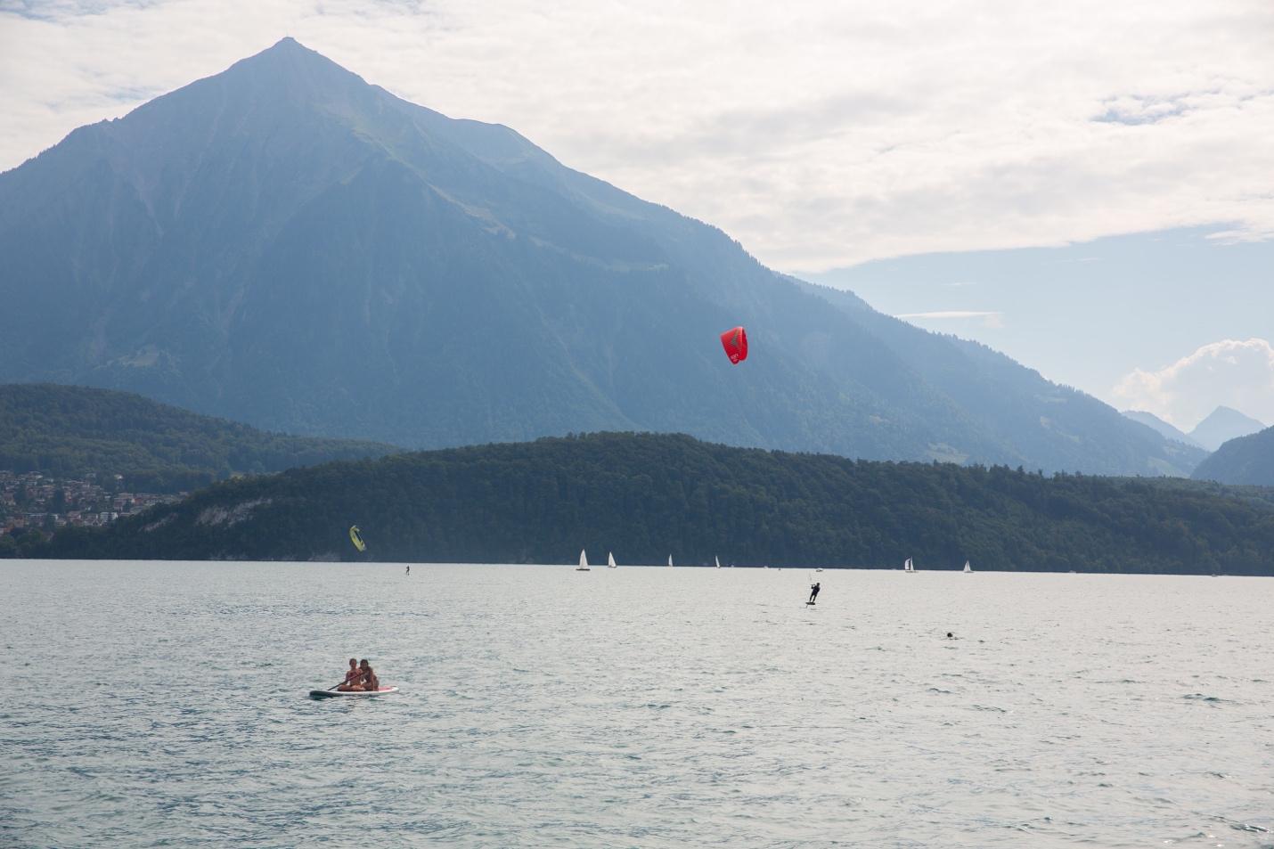 A group of people on a lake

Description automatically generated