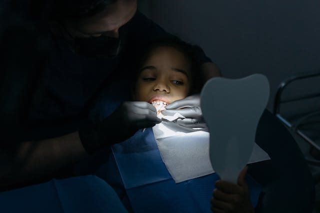 dentist checking a patient