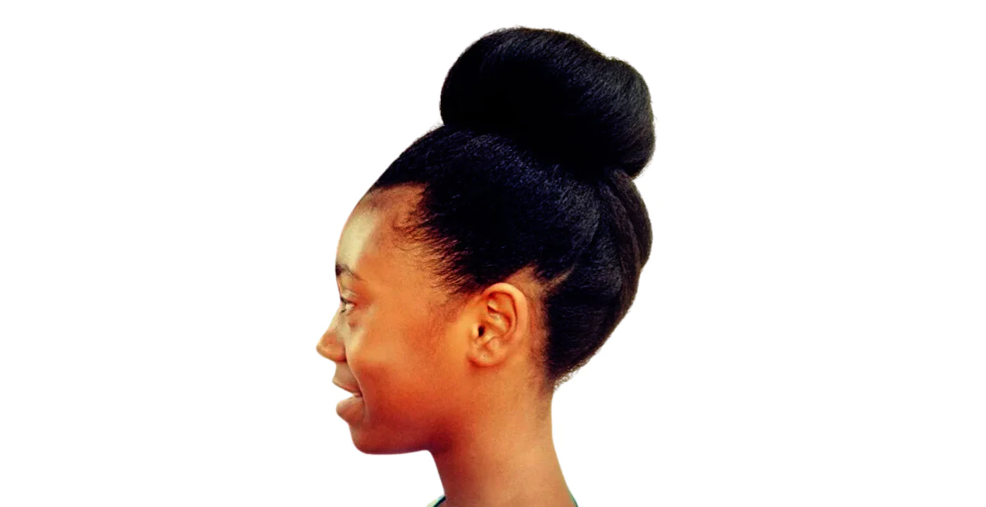 Side view of a lady rocking the Afro updo
