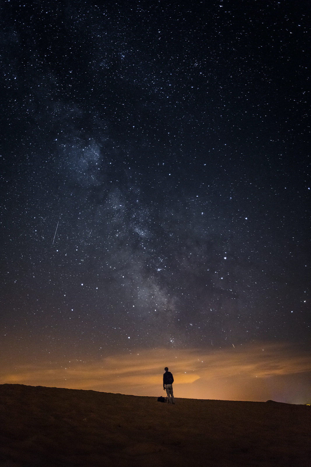 A person exploring the beautiful night sky.