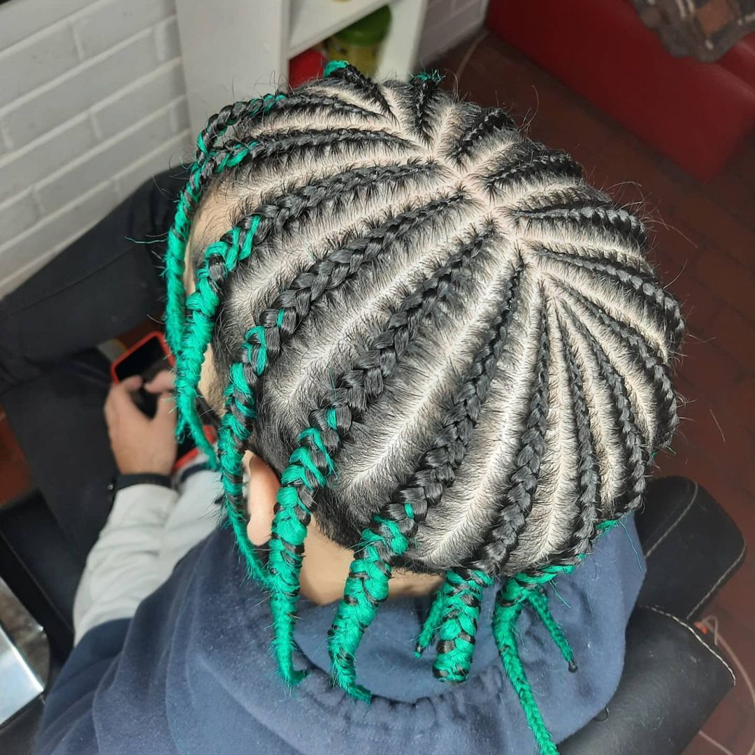 55. Hat Cornrows With Green Colored Ends