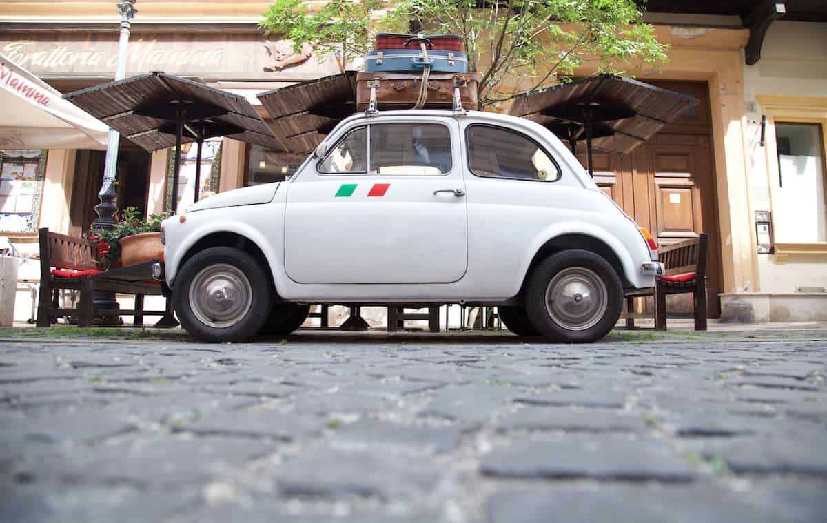 white fiat 500 on its way to Naples Italy