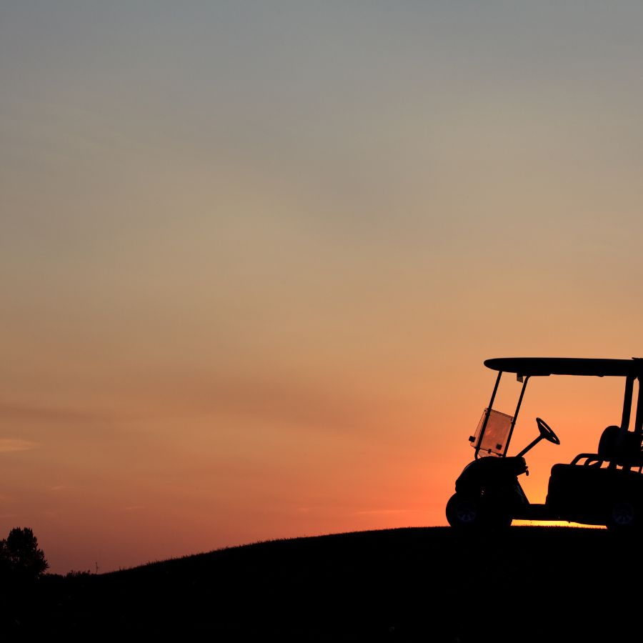 golf cart in the sunset