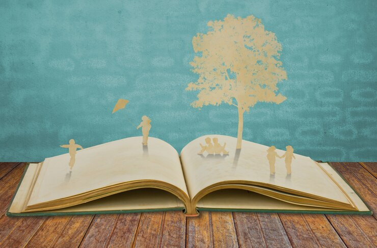 Silhouettes of trees and people in a tranquil wooded area on a book.