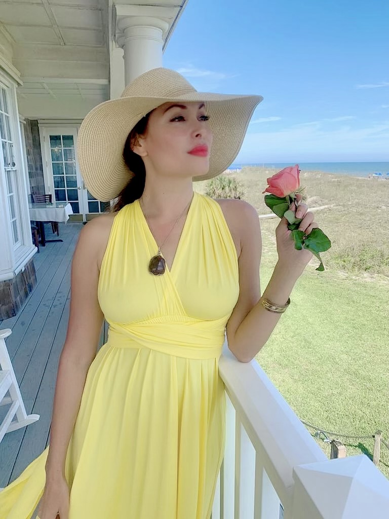 Radhaa Nilia, galactic goddess, goddess code academy, Radhaa Publishing House, publishing priestess, empress, goddess code, goddess activation, Florida, rose, yellow dress, artist, filmmaker, author, publisher, Radhaa, rose priestess, beach
