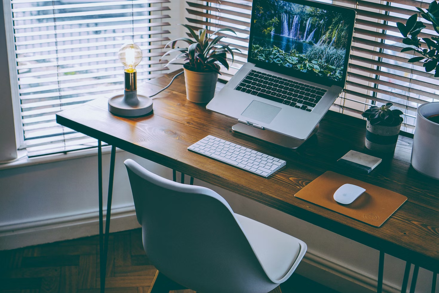 home office table with laptop