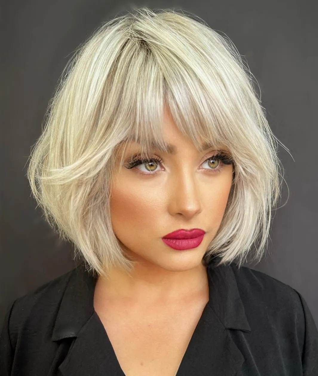 Picture of a girl wearing her Off-Center Bangs on Short Hair