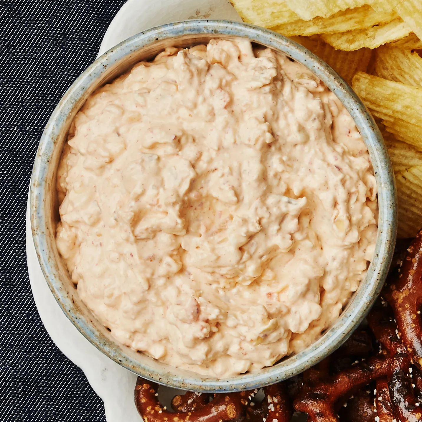 A picture of a plate of creamy kimchi dip, perfect for a board game party.