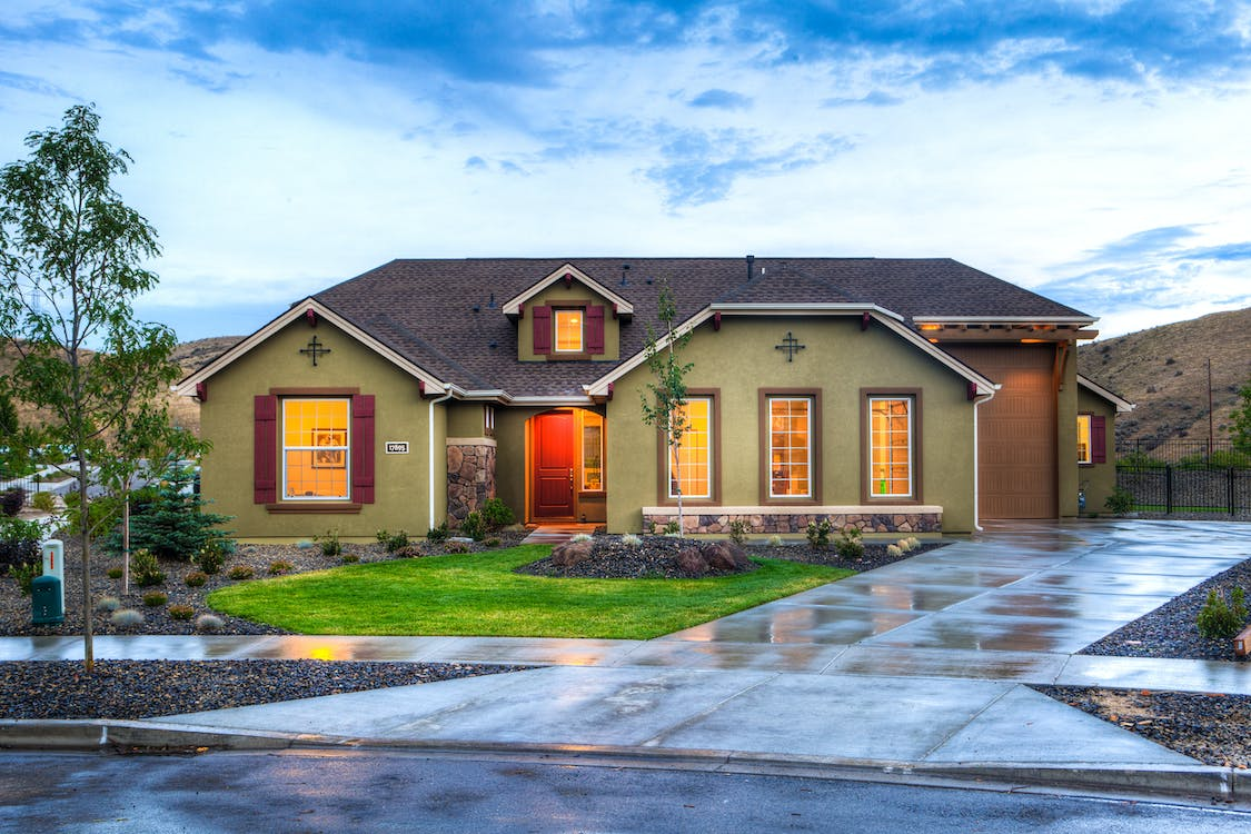 A well lit house on a new development