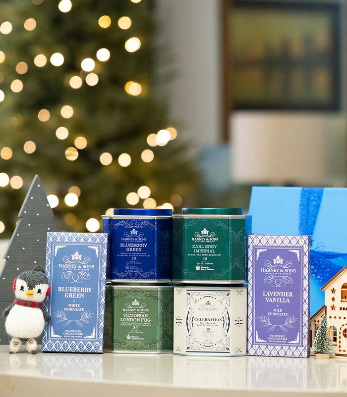 Warm up your winter with the Winter Blues Gift, offering four classic teas from Harney & Sons. Enjoy the flavorful Blueberry Green, the delightful Victorian London Fog with lavender and bergamot, the bold Earl Grey Imperial, and the festive Celebration Tea—blending deep fruity flavors, hazelnut, and warm cinnamon. This gift also includes two Harney & Sons chocolate bars, perfect for chasing away the wintertime chill.