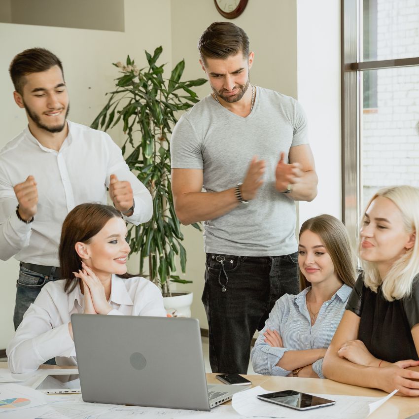 Team members clapping hands