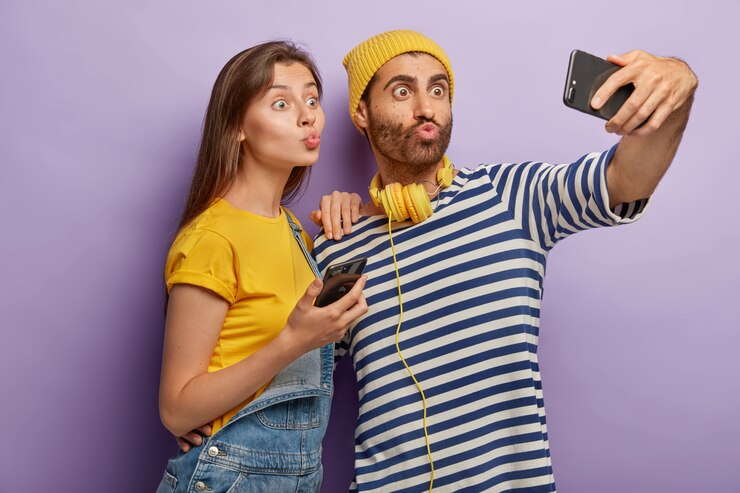 A Couple Taking a Funny Selfie