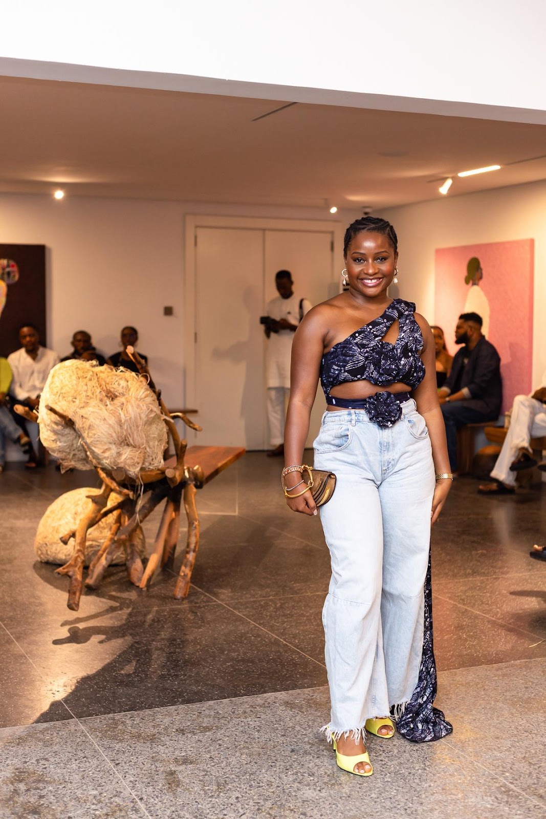 Picture of an attendee in a beautiful ankara top and jean for the event