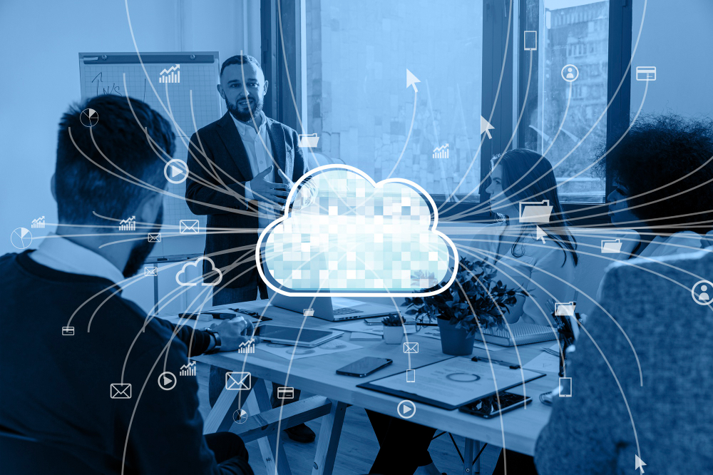  a business setting overlaid with cloud computing symbols, suggesting a focus on digital transformation and connectivity in the workplace.