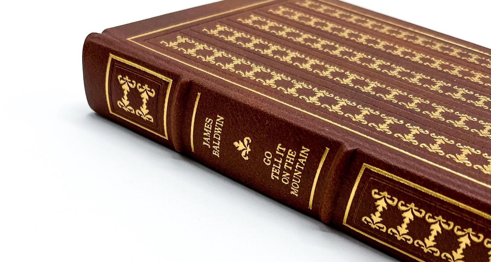Photo of hardbound book red and gilded 