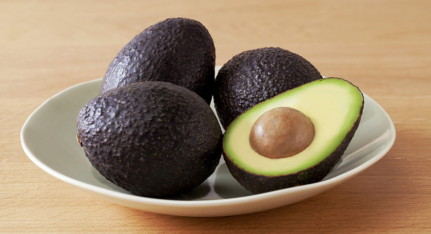 How many avocado fruits can one tree produce in a year