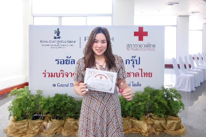 employees awarded with brooch and certificate for their generosity to donate blood
