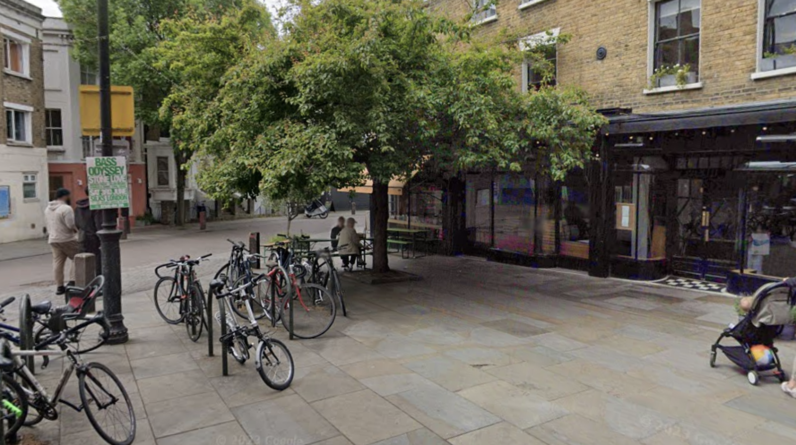 Google maps photograph of the street outside Herne Hill station leading onto Railton Road