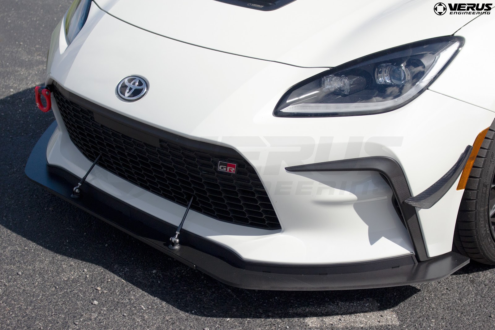 Front splitters increase downforce on a Toyota GR