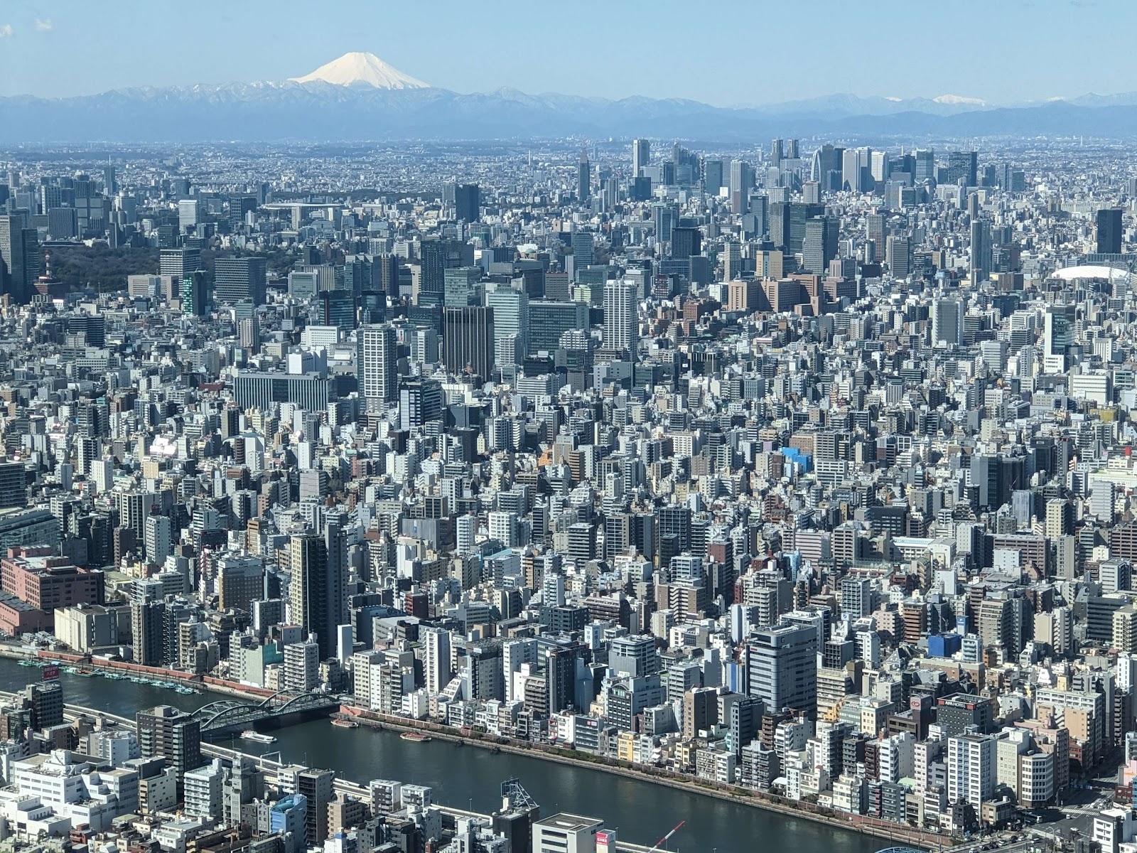 Sprawling Tokyo metropolis with snow capped Mount Fuji in the background as seen from the Tokyo Skytree