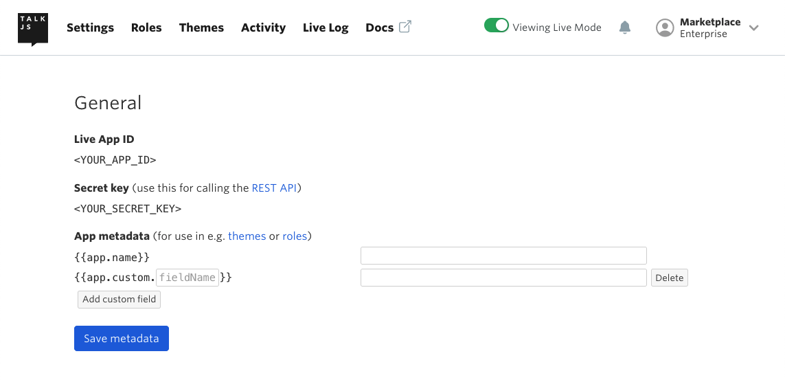 Overview of the TalkJS dashboard, under the Settings tab, under the heading ‘General’, there is an overview of your app ID, secret key, and a heading ‘App metadata’ with the option to edit metadata for your app. Already listed are `{{app.name}}`, followed by an empty field where you can fill out the app’s name, and `{{app.custom.__}}` with the placeholder text ‘fieldname’, and the option to fill out the value for this field, and a ‘Delete’ button to delete this entire custom metadata field. Another button ‘Add custom field’ allows you to add another field. At the bottom of the section is a button ‘Save metadata’ to save all changes.