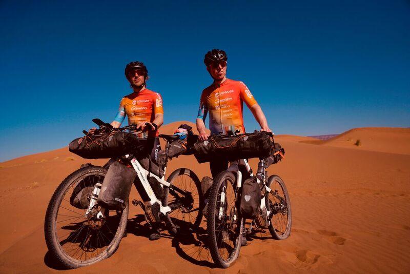 Riding through the desert regions of Morocco with e-bike frames made of Luvocom XCF.