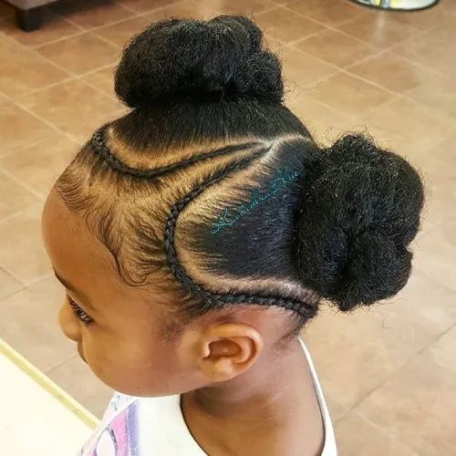Picture showing a beautiful girl with braids and  buns