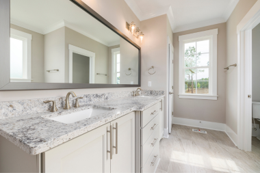 comparing bathroom countertop options for your home remodel marble countertops sink vanity custom built michigan