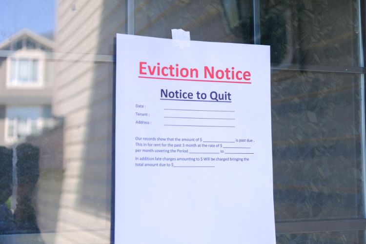 Eviction notice hung on a door